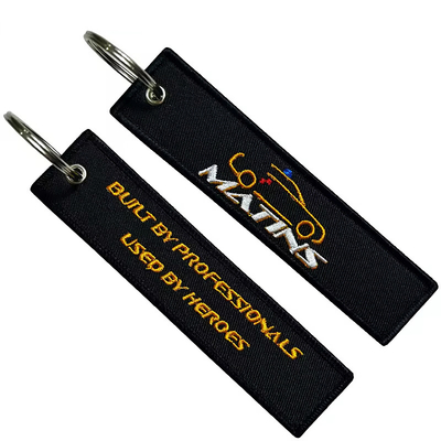 Χονδρικό Olecranon Hook φθηνό Custom πτήση υφάσματα κεντήματα Τζετ ετικέτα υφασμένο Keychain με το δικό σας λογότυπο