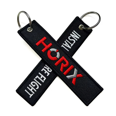 Χονδρικό Olecranon Hook φθηνό Custom πτήση υφάσματα κεντήματα Τζετ ετικέτα υφασμένο Keychain με το δικό σας λογότυπο