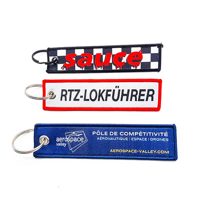 Φαστική υφασμένη ύφασμα αλυσίδα κλειδιών patch κενό Διπλό πλευρικό κεντημένο Jet Tag εξατομικευμένο κέντημα keychain