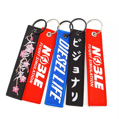 Μοντέλ Σχεδιασμός Βραβευμάτων Patch Kevchain Woven Fabric Keyring με το δικό σας λογότυπο