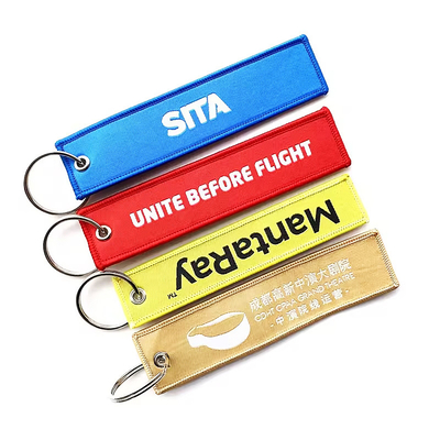 Προσαρμοσμένο λογότυπο Προωθητικά δώρα Jet Tag υφασματική κέντραση Κλειδιά αυτοκινήτου Κλειδιά από υφασμένο