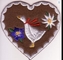 Σίδηρος Twill καρδιών Edelweiss χήνων χώρας μπαλωμάτων κεντητικής ιματισμού στο υπόβαθρο υφάσματος